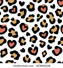 Leopard print with hearts. Seamless leopard pattern. Leopard spots. Abstract animal print. Vector