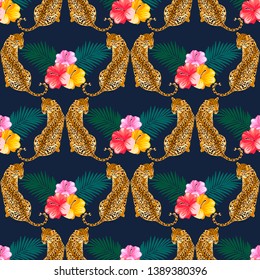 Leopard print pattern with tropical leaves, flower background. Popular seamless pattern design. Wild big cats
