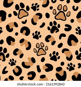 Leopard print with paw of dogs and cats. Cat paw pattern. Camouflage leopard vector seamless pattern on beige background. Leopard skin texture. 