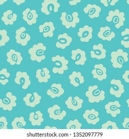 Leopard Print Seamless Vector Pattern. Leopard print design with floral elements in pastel turuoise colors. Surface pattern design for fabric, wallpaper, scrapbooking projects or backgrounds.