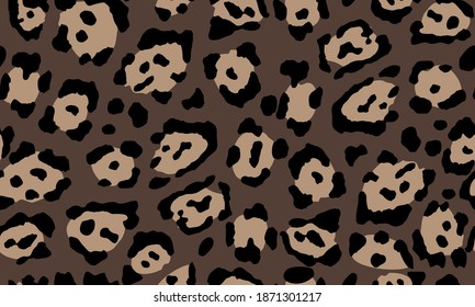 Leopard print. Trendy seamless vector print. The texture of the animals. Jaguar spots on a beige background. Imitation of cheetah skin painted on clothes or fabric, modern textile