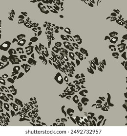 Leopard print vector seamless. Fashionable background for fabric, paper, clothes. Animal pattern. Green background