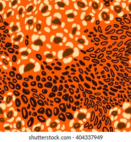 Leopard print vector seamless pattern. Hand drown animal spots with chevron effect on an orange backdrop.