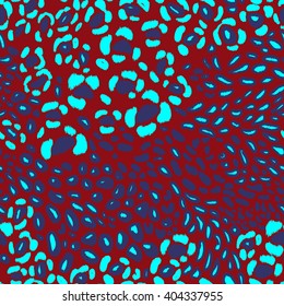 Leopard print vector seamless pattern. Vibrant hand drown animal spots with chevron effect on an orange backdrop.