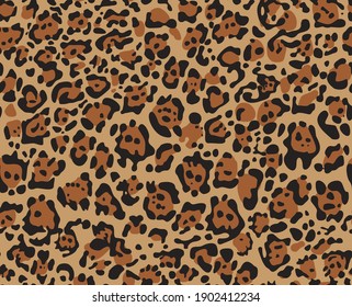 
Leopard seamless pattern. Abstract background of dark spots on an orange background. Modern print. Vector