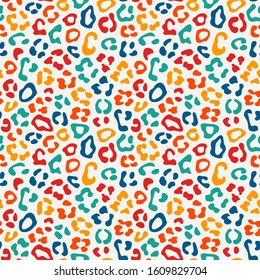 Leopard seamless pattern. Animal skin print. Bright colors with repeating spots motif. Wildlife, natural camouflage texture. Savannah safari inspired background. Vector abstract wallpaper