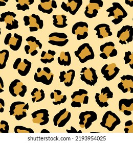 Leopard seamless pattern on yellow background. Abstract art print. Design for paper, covers, cards, fabrics, interior items and any. Vector illustration of skin animal.