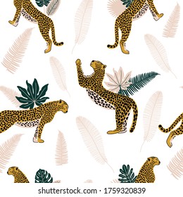 Leopard seamless pattern with tropical leaves. Vector illustration.