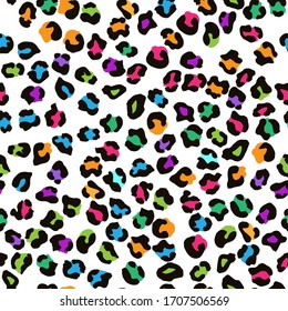 Leopard seamless pattern. Vector animal print. Multi colored spots on a white background. Jaguar, leopard, cheetah, panther fur. Leopard skin imitation can be painted on clothes or fabric.