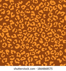 Leopard seamless pattern. Vector animal print. Orange spots on a brown background. Jaguar, leopard, cheetah, panther fur. Leopard skin imitation can be painted on clothes, paper or fabric.