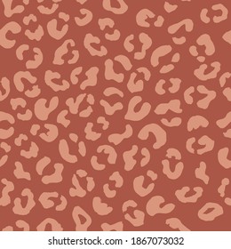 Leopard seamless pattern. Vector animal print. Pale beige spots on a beige background. Jaguar, leopard, cheetah, panther fur. Leopard skin imitation can be painted on clothes, paper or fabric.