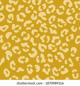 Leopard seamless pattern. Vector animal print. Light yellow spots on a yellow background. Jaguar, leopard, cheetah, panther fur. Leopard skin imitation can be painted on clothes, paper or fabric.