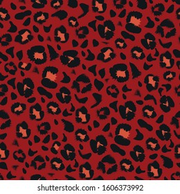Leopard seamless pattern in vector. Fashionable red background with print
