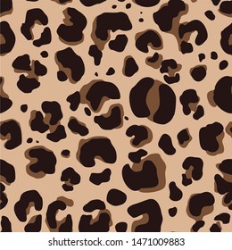 Leopard seamless pattern.Dark spots on orange background.Print on fabric on paper.Vector