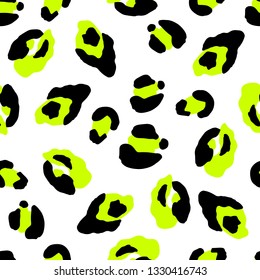 Leopard seamless vector pattern with neon yellow spots. Animal print