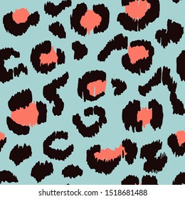Leopard skin. Animal print. Texture with foil effect. Ikat geometric folklore ornament. Vector seamless pattern. Tribal ethnic texture.