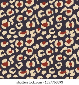 Leopard skin. Animal print. Texture with foil effect. Ikat geometric folklore ornament. Vector seamless pattern. Tribal ethnic texture.