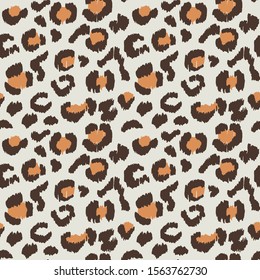 Leopard skin. Animal print. Texture with foil effect. Ikat geometric folklore ornament. Vector seamless pattern. Tribal ethnic texture.