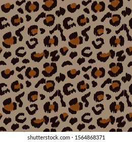Leopard skin. Animal print. Texture with foil effect. Ikat geometric folklore ornament. Vector seamless pattern. Tribal ethnic texture.