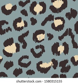 Leopard skin. Animal print. Texture with foil effect. Ikat geometric folklore ornament. Vector seamless pattern. Tribal ethnic texture.