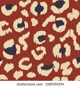 Leopard skin. Animal print. Texture with foil effect. Ikat geometric folklore ornament. Vector seamless pattern. Tribal ethnic texture.