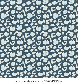 Leopard skin. Animal print. Texture with foil effect. Ikat geometric folklore ornament. Vector seamless pattern. Tribal ethnic texture.