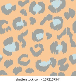 Leopard skin. Animal print. Texture with foil effect. Ikat geometric folklore ornament. Vector seamless pattern. Tribal ethnic texture.
