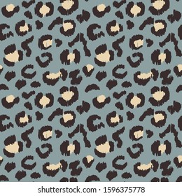 Leopard skin. Animal print. Texture with foil effect. Ikat geometric folklore ornament. Vector seamless pattern. Tribal ethnic texture.