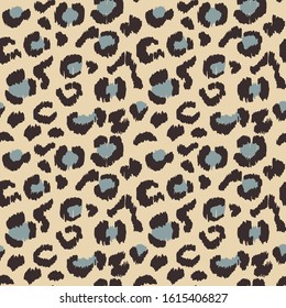 Leopard skin. Animal print. Texture with foil effect. Ikat geometric folklore ornament. Vector seamless pattern. Tribal ethnic texture.