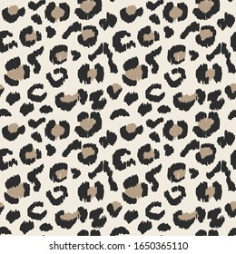 Leopard skin. Animal print. Texture with foil effect. Ikat geometric folklore ornament. Vector seamless pattern. Tribal ethnic texture.