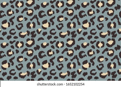 Leopard skin. Animal print. Texture with foil effect. Ikat geometric folklore ornament. Vector seamless pattern. Tribal ethnic texture.