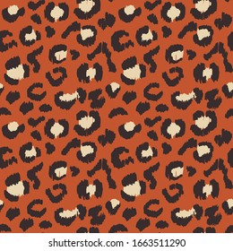Leopard skin. Animal print. Texture with foil effect. Ikat geometric folklore ornament. Vector seamless pattern. Tribal ethnic texture.