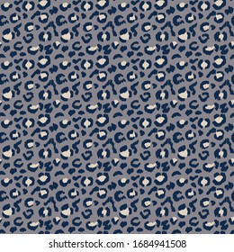 Leopard skin. Animal print. Texture with foil effect. Ikat geometric folklore ornament. Vector seamless pattern. Tribal ethnic texture.