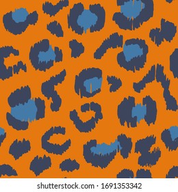 Leopard skin. Animal print. Texture with foil effect. Ikat geometric folklore ornament. Vector seamless pattern. Tribal ethnic texture.