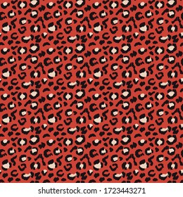 Leopard skin. Animal print. Texture with foil effect. Ikat geometric folklore ornament. Vector seamless pattern. Tribal ethnic texture.