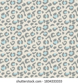 Leopard skin. Animal print. Texture with foil effect. Ikat geometric folklore ornament. Vector seamless pattern. Tribal ethnic texture.