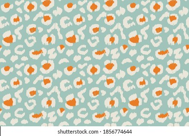 Leopard skin. Animal print. Texture with foil effect. Ikat geometric folklore ornament. Vector seamless pattern. Tribal ethnic texture.