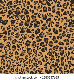 Leopard skin seamless pattern. Abstract pattern of dark spots on an orange background. Fabric print. Vector