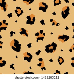 Leopard skin seamless pattern or animal fur spotted trendy print texture, vector illustration. Wild exotic animals and safari classic design for textile,fashion and web projects.