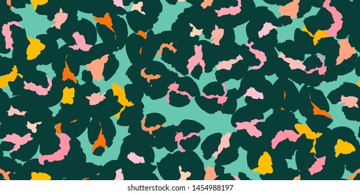 Leopard spots or hand-drawn abstract flowers seamless pattern design. Vector illustration background 