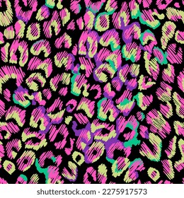 Leopard spots in neon on a black background. Seamless pattern. 