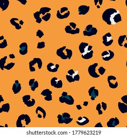 Leopard spots seamless pattern design. Vector illustration background 