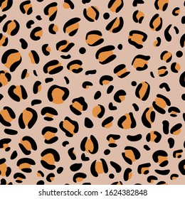 Leopard spots are a seamless pattern of natural color. Yellow-orange animal print. Trends. Black spot. Wildlife. Textile print. Vector illustration