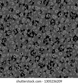 Fondo monocromo de piel de leopardo. Patrón ininterrumpido animal.