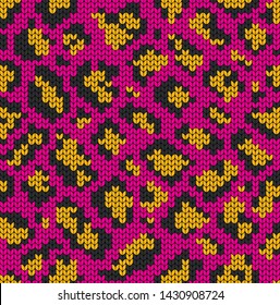 Leopard texture, fur imitation. Seamless decorative background. Jacquard weave. Knitted pattern.