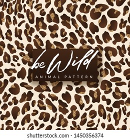 Leopard vector golden seamless pattern. Trendy fashion textile print design in gold shiny colors. Animal fur background with glitter texture. Be wild hand drawn watercolor calligraphy lettering.
