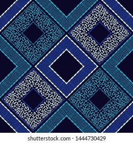 Leopard and Zebra spots. Ethnic boho seamless pattern. Embroidery on fabric. Patchwork texture. Traditional ornament. Tribal pattern. Folk motif. Can be used for wallpaper, textile, wrapping, web.