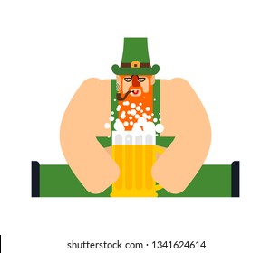 Leprechaun and Beer mug ale. St. Patricks Day character. Irish holiday. Dwarf in green hat
