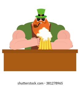 Leprechaun drinking beer. Big and serious leprechaun at  bar holds pint of ALE. Powerful magical midget with  big Red Beard. Green frock coat and hat cylinder. Irish holiday St. Patrick's day.