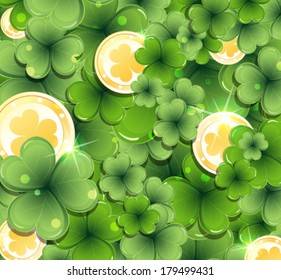 Leprechaun gold coins on clover background.  St. Patrick's Day background.